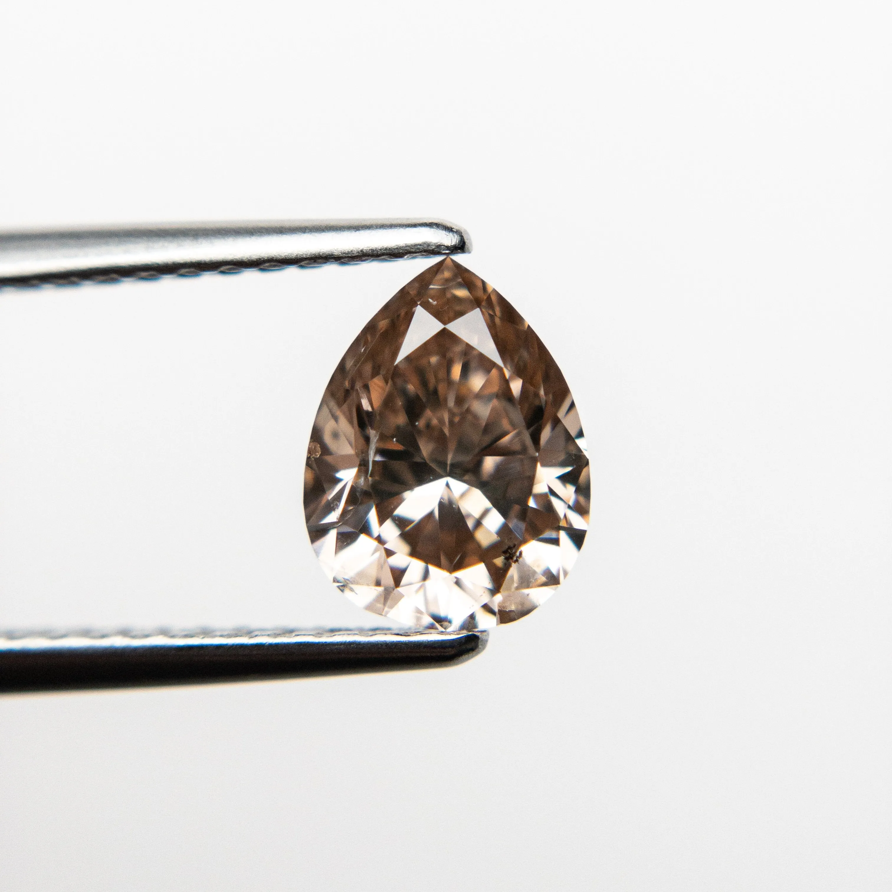 1.06ct 7.73x5.92x3.64mm Argyle GIA I1 Fancy Brown Pink Pear Brilliant 18562-01 HOLD D1922