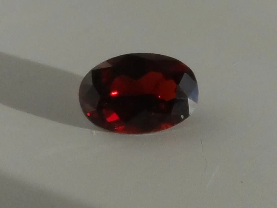 1.45 CTS. SPARKLING DARK BLOOD RED OVAL CUT MONTANA GARNET