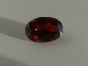 1.45 CTS. SPARKLING DARK BLOOD RED OVAL CUT MONTANA GARNET