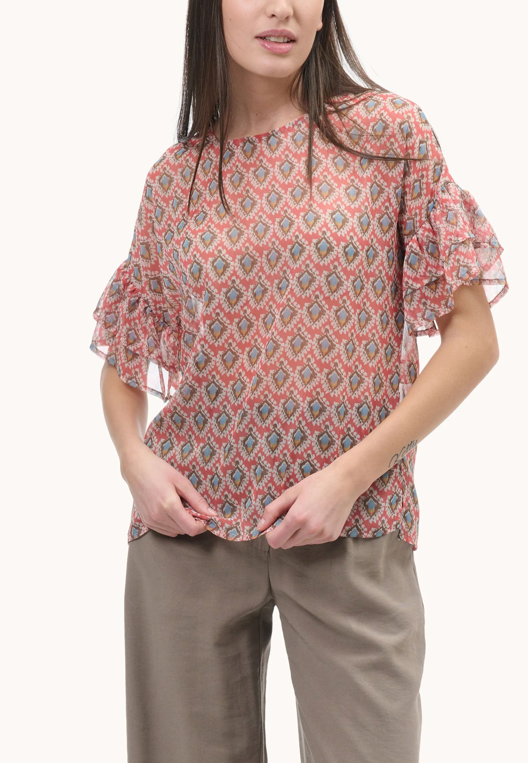 Blusa in fantasia astratta rombi