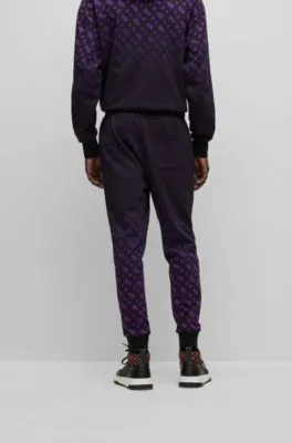 BOSS x Khaby Relaxed-fit cotton-blend tracksuit bottoms with gradient monograms