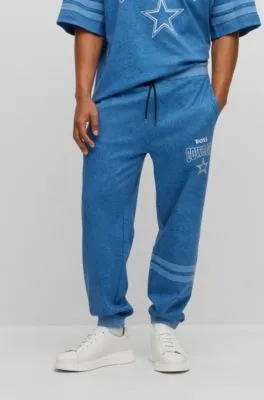 BOSS x NFL oversize-fit tracksuit bottoms in denim-look cotton