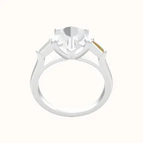 Cathedral Band with Tapered Baguette Sidestones Engagement Ring With Low Set Four Prong Head