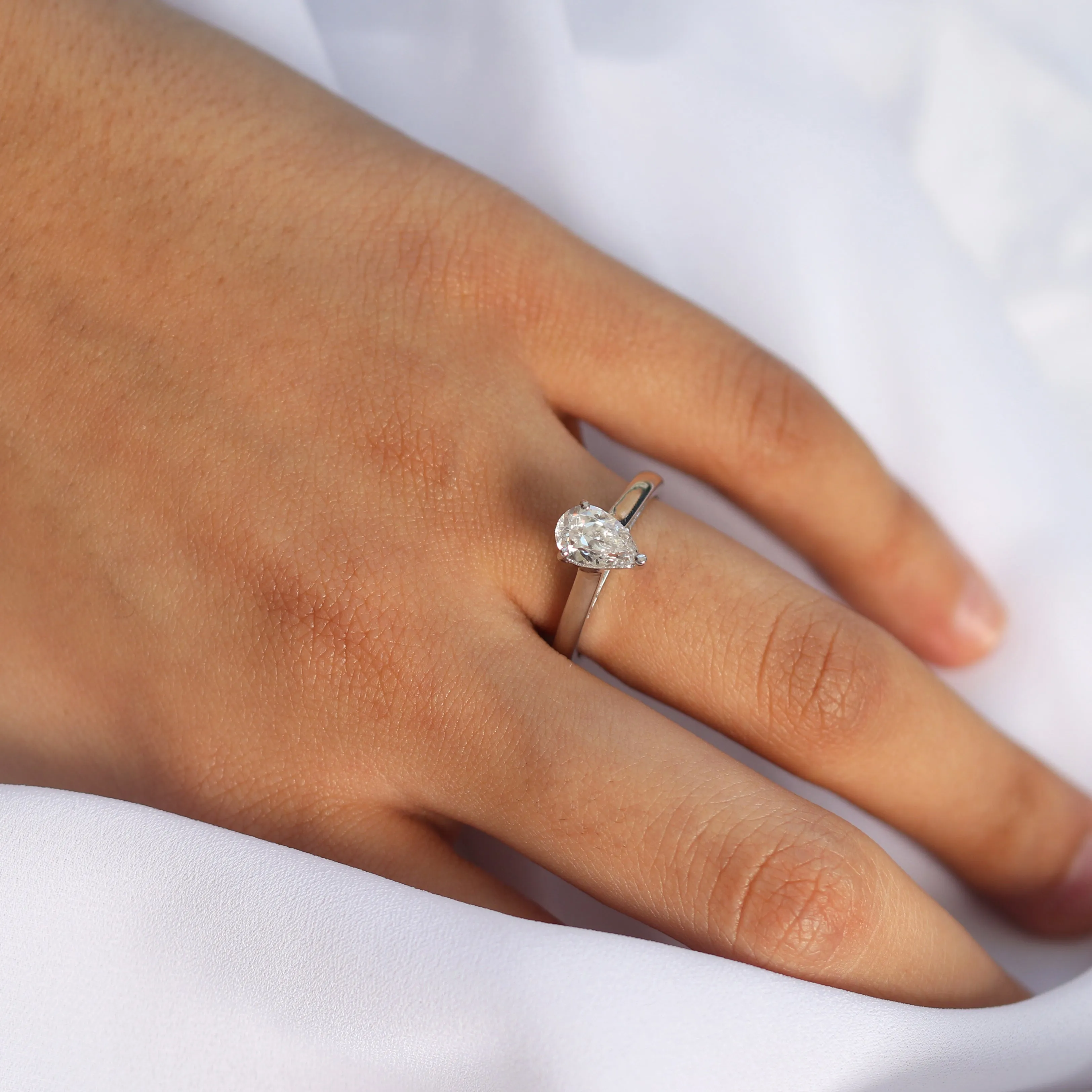 custom pear shape diamond ring