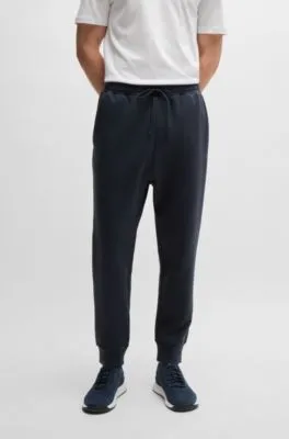 Stretch-cotton tracksuit bottoms with logo print