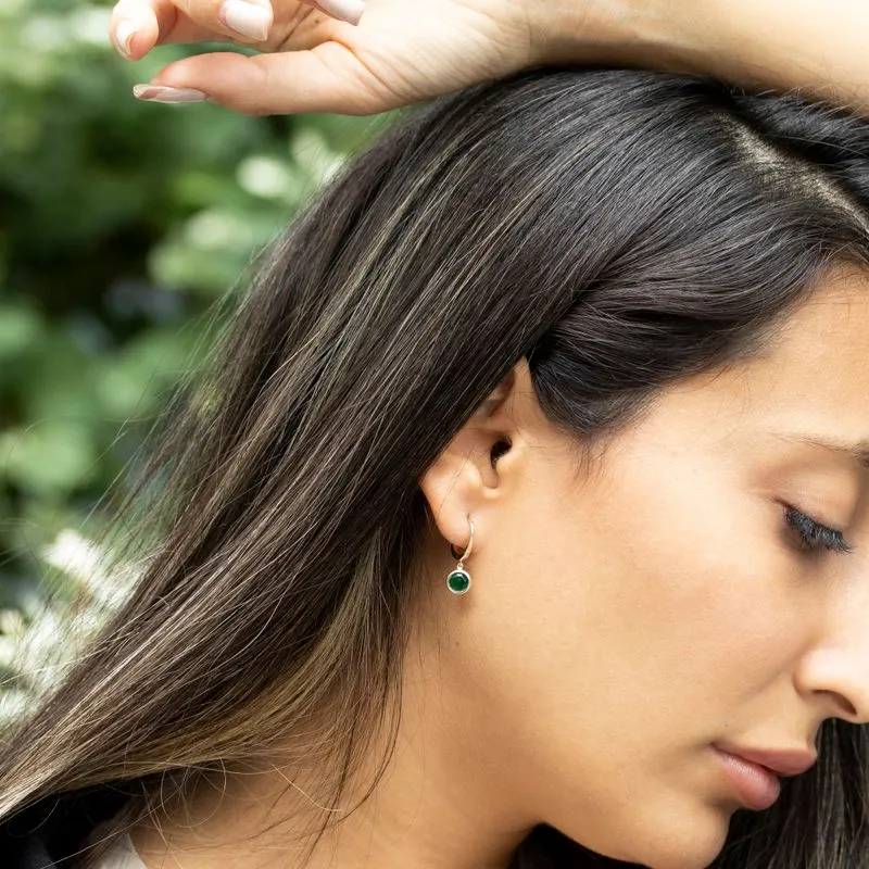 Yellow gold dangling earring studded with green zircon 5 mm